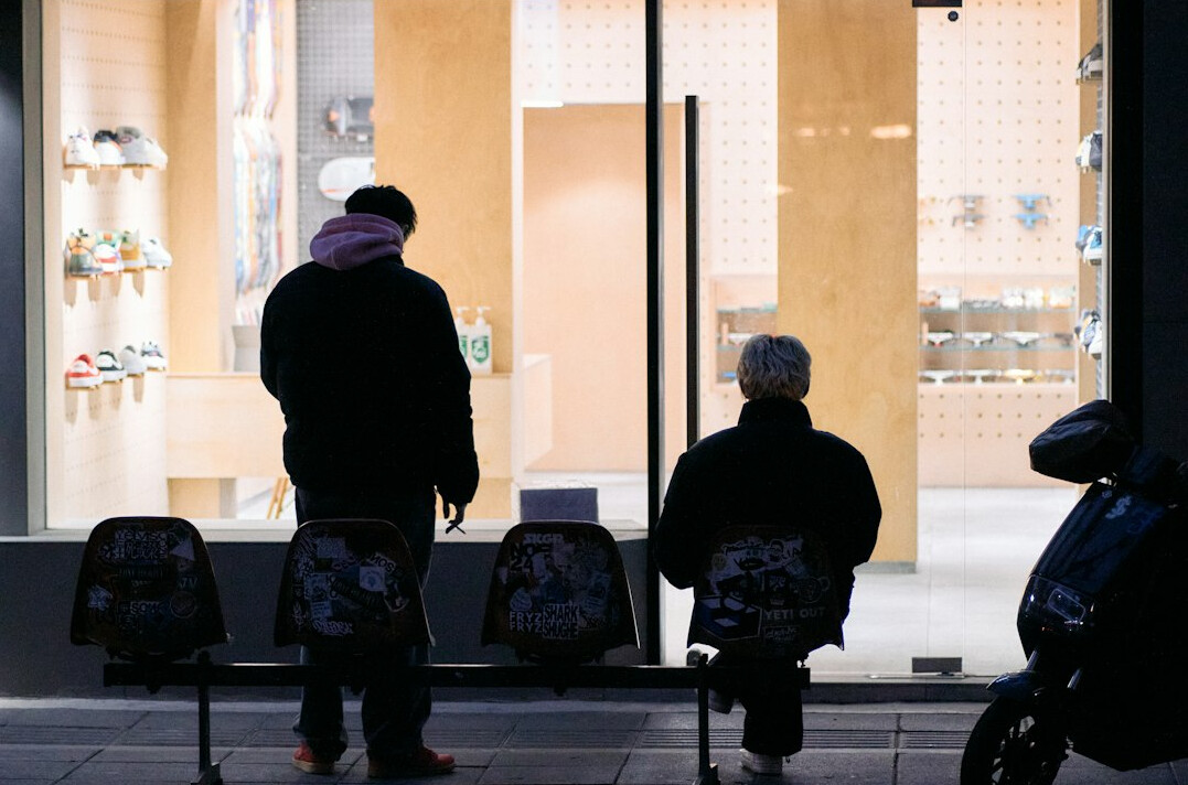 store security guard watching customers